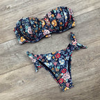 Floral print bandeau bikini swimwear in vibrant colors, featuring a strapless design and tropical floral pattern.