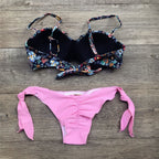 Floral print bandeau bikini swimwear by 64b136-1e, featuring a strapless top with vibrant floral patterns.
