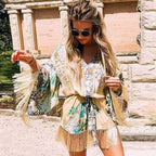 Kimono mini dress with tassels from 64b136-1e, featuring a lightweight, flowy design and decorative tassel accents.