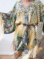 Kimono mini dress with tassels, stylish summer dress from 64b136-1e, featuring flowing fabric and decorative tassel details.
