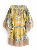 Kimono mini dress with tassels from 64b136-1e, featuring flowing fabric and decorative tassel accents, perfect for summer wear.