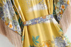 Kimono mini dress with tassels by 64b136-1e, featuring a flowy silhouette and decorative tassel details, ideal for casual wear.