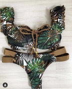 Ruffle low waist bikini set by 64b136-1e featuring multiple colorful prints, with ruffled details and adjustable straps.