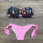 Floral print bandeau bikini swimwear by 64b136-1e, featuring a strapless top with vibrant floral patterns.