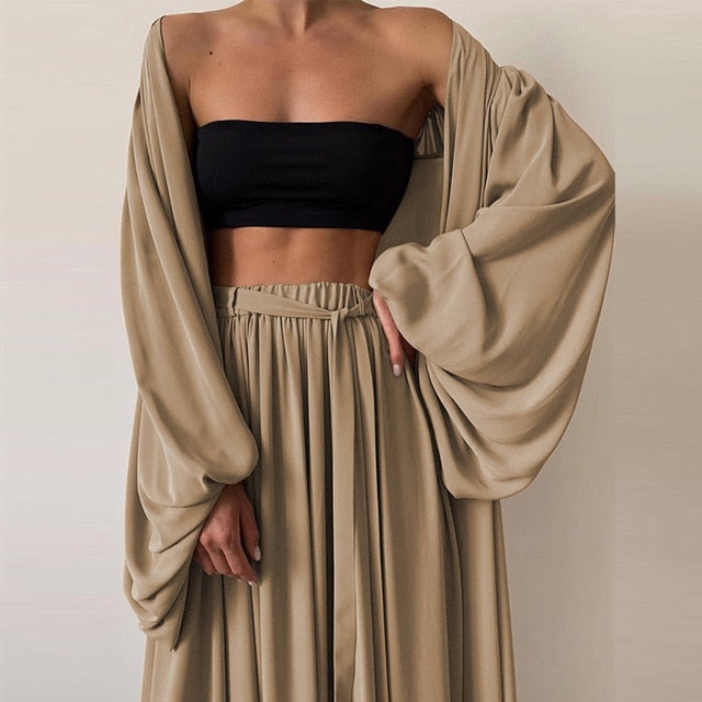 Three-piece boho set from 64b136-1e featuring patterned fabrics and coordinated accessories, perfect for casual bohemian style.