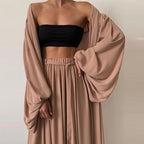 Three-piece boho clothing set from 64b136-1e featuring flowy fabrics and earthy tones, perfect for casual or festival wear.