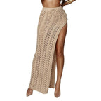 Crochet knitted maxi skirt with high slit from 64b136-1e, featuring intricate crochet patterns and flowing fabric.