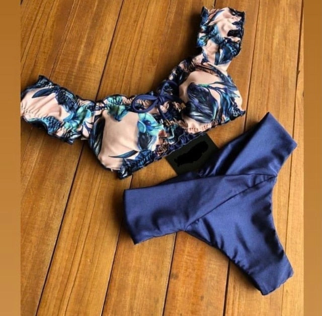 Ruffle low waist bikini set with multiple prints, stylish swimwear from brand 64b136-1e, featuring ruffled details and vibrant patterns.