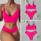 Brazilian two-piece bathing suit from 64b136-1e, showcasing vibrant swimwear with a stylish bikini top and bottom.