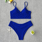Brightly colored two-piece Brazilian swimwear by 64b136-1e featuring a stylish bikini top and matching bottom.