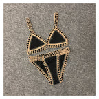 Black crochet bikini set from 64b136-1e featuring a stylish swimwear design with detailed crochet patterns.