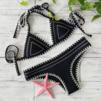 Neoprene bikini swimwear set by 64b136-1e with a stylish top and bottom, perfect for beach or poolside lounging.