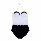 Women's one-piece swimsuit from 64b136-1e, featuring a stylish swimwear design with a plunging neckline and vibrant pattern.