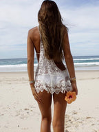 Beige lace V-neck beach cover-up for swimwear, lightweight and stylish, shown on model with beach background.