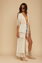 White tassel kimono tunic dress from 64b136-1e featuring flowing fabric and side slits, perfect for casual or boho style.