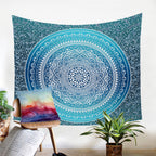 Indie tapestry beach rug or yoga mat in red, blue, or white with intricate patterns, suitable for decor or outdoor use.