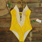 64b136-1e lace one-piece swimsuit featuring various styles and prints, shown in a stylish swimwear design with lace details.