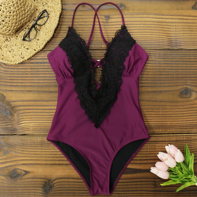 Black lace one-piece swimsuit from 64b136-1e featuring stylish design and available in five prints and styles.