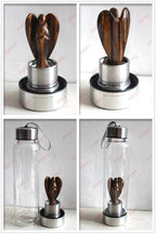 Hand-carved Natural Angel Crystal Water Bottle by 64b136-1e with intricate angel design, made from clear crystal, designed for water storage.