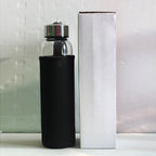 Hand-carved natural angel crystal water bottle from 64b136-1e, showcasing intricate crystal details and craftsmanship.