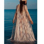 White lace cardigan tunic from 64b136-1e, featuring delicate lace fabric and a relaxed top style, displayed on a hanger.