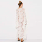 White lace kimono slip dress from 64b136-1e, featuring delicate lace fabric and a flowing, elegant design.