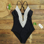 Black lace one-piece swimsuit by 64b136-1e featuring stylish lace details and available in multiple prints and styles.
