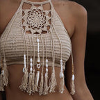 Tassel crochet crop bikini top in swimwear style with tassel accents, by brand 64b136-1e, shown on a model.