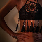 Crochet tassel bikini top from 64b136-1e swimwear with a stylish crop design and decorative tassels for beach or pool.