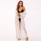 White lace kimono cardigan from 64b136-1e, featuring delicate lace fabric, flowing sleeves, and open front design.