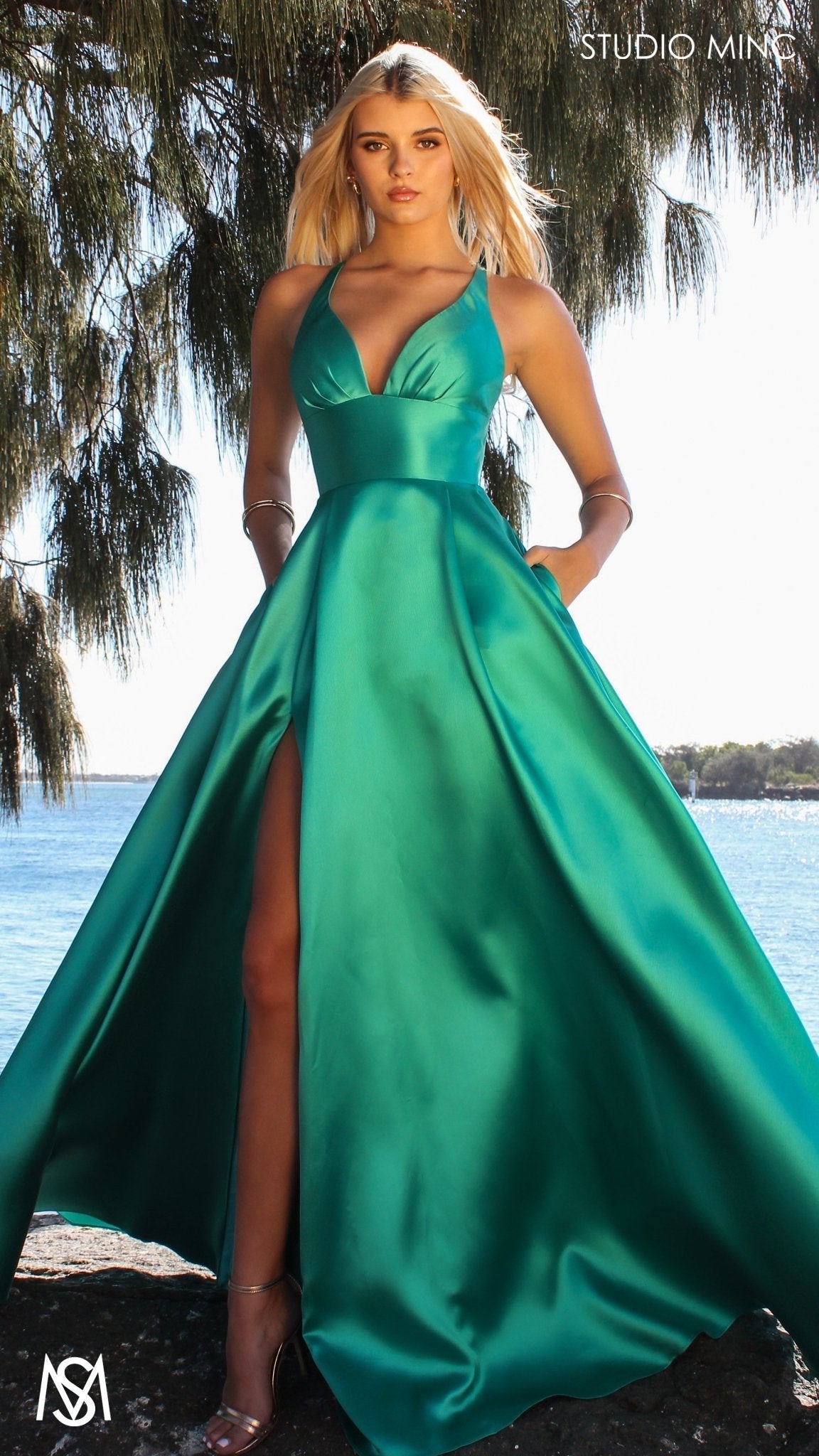 Riviera - Teal Green formal dress | V Plunge neckline, backless Satin Gown with Pockets and leg slit